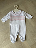 White pink smocked sleepsuit