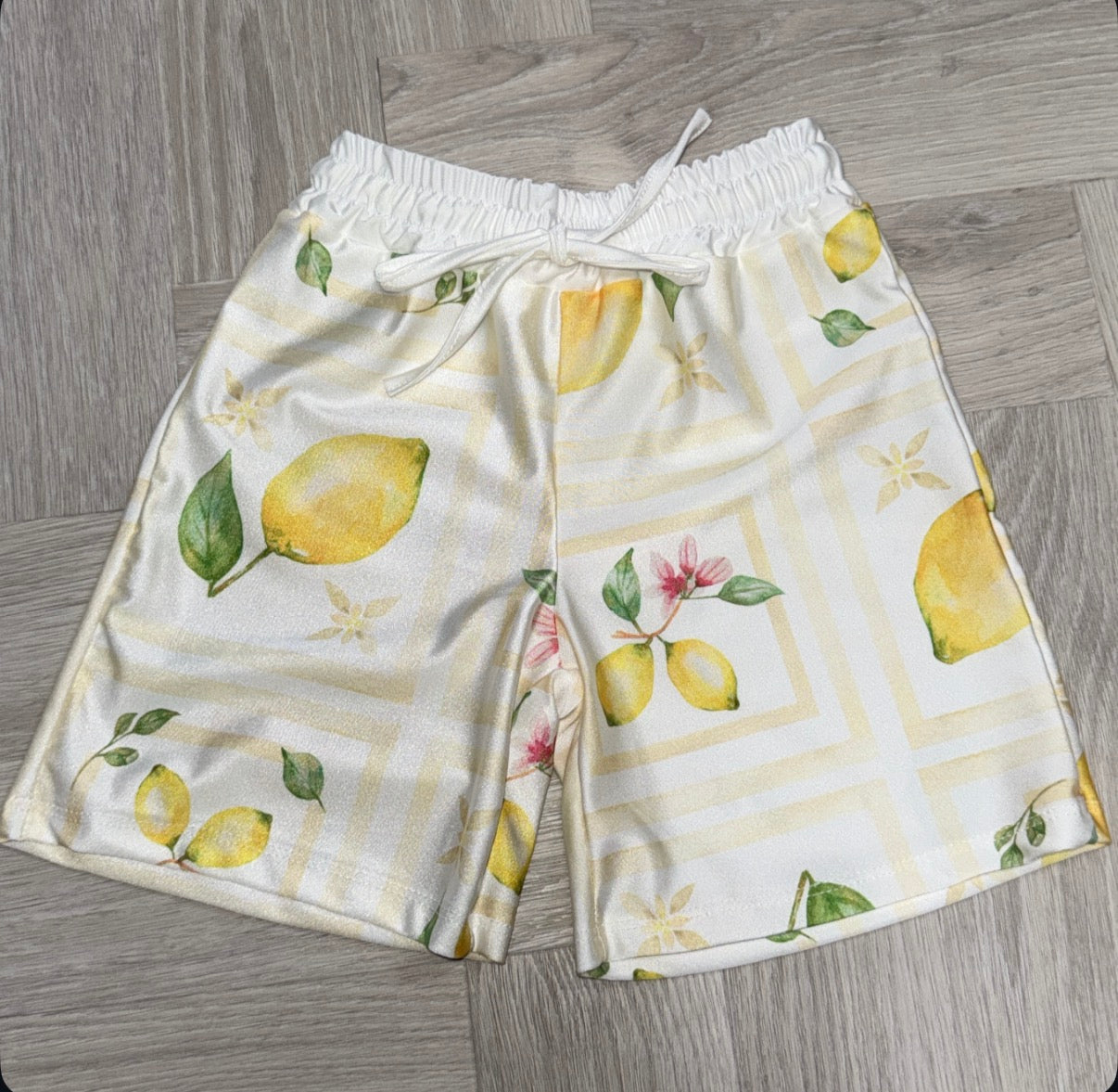 Lemon print beach shorts